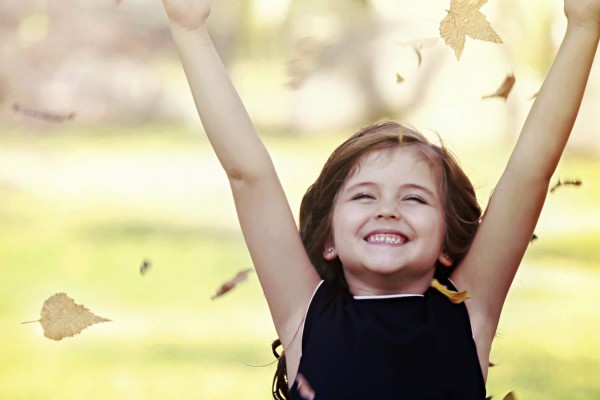 Happy little girl in autumn